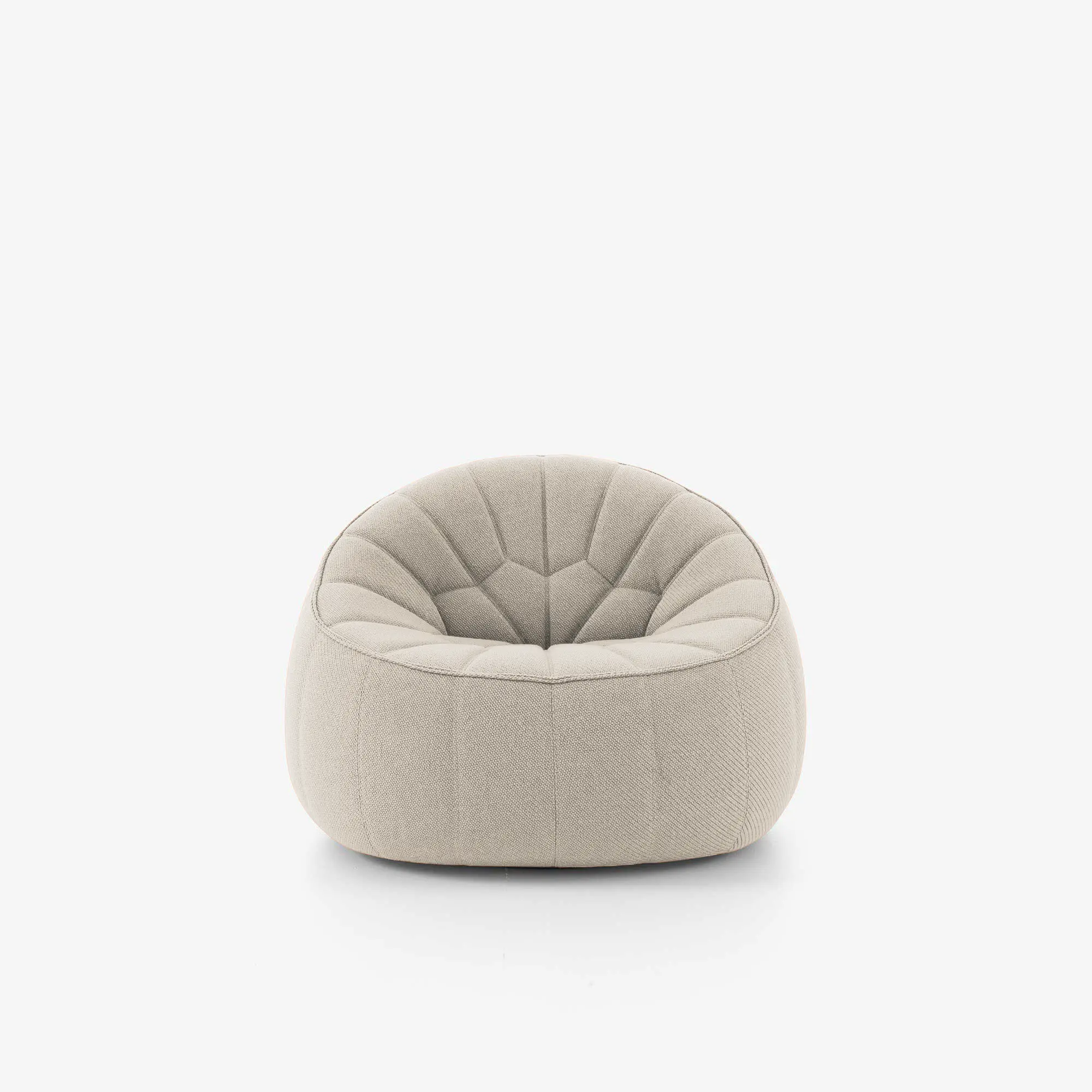 Beige cushioned swivel armchair with quilted upholstery and rounded design on a white background.