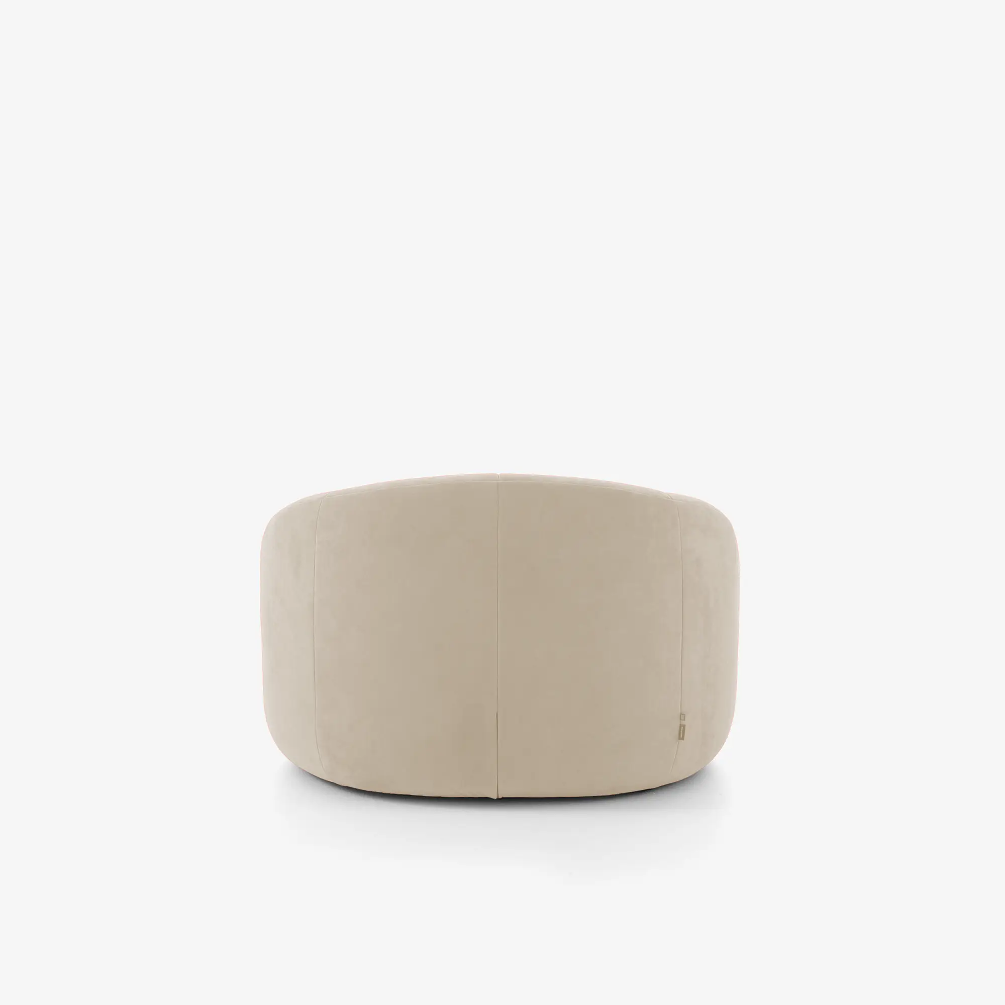 Beige curved armchair with a plush, rounded backrest on a white background.